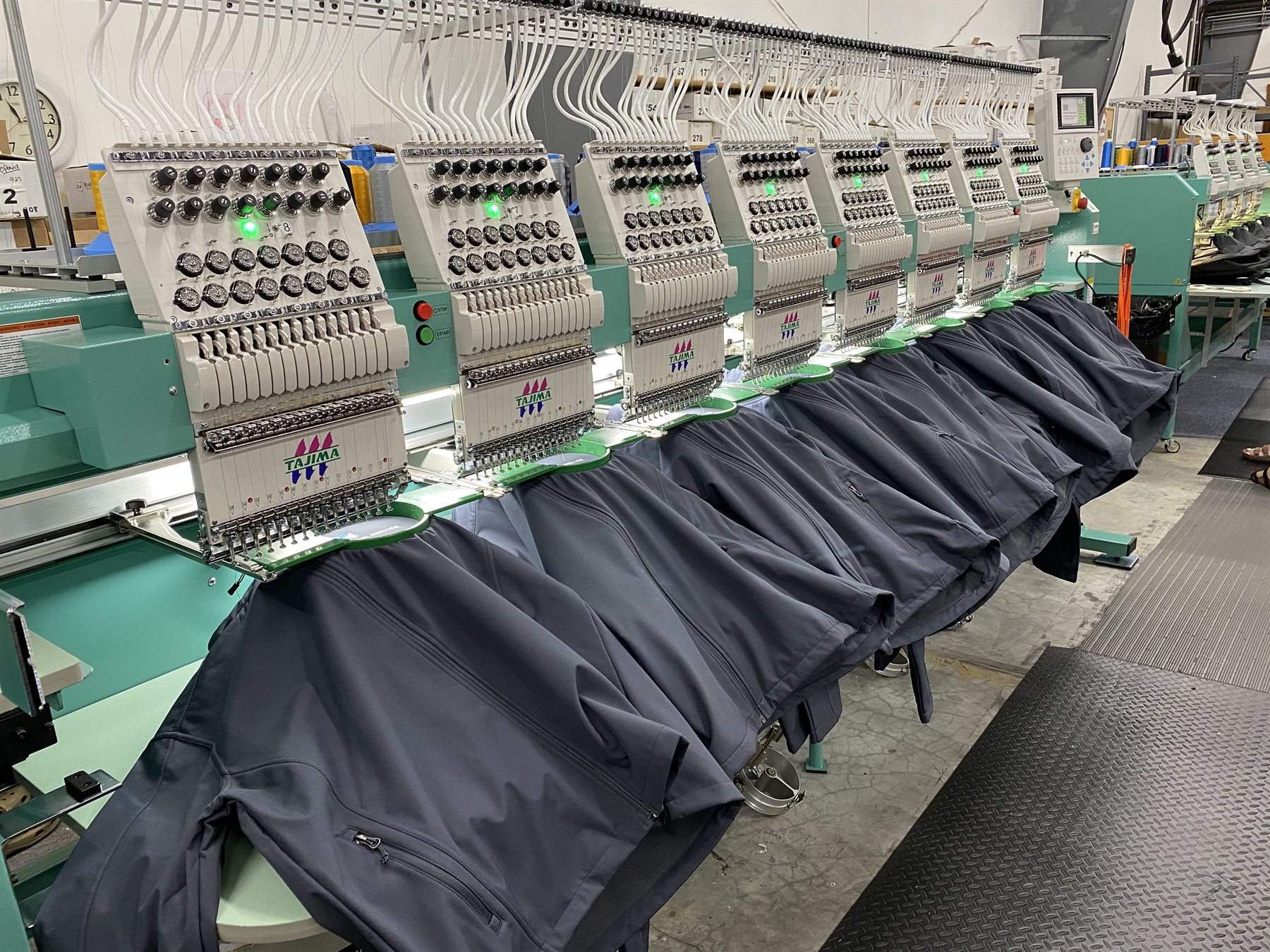Waterproof jacket production on multi-head embroidery equipment
