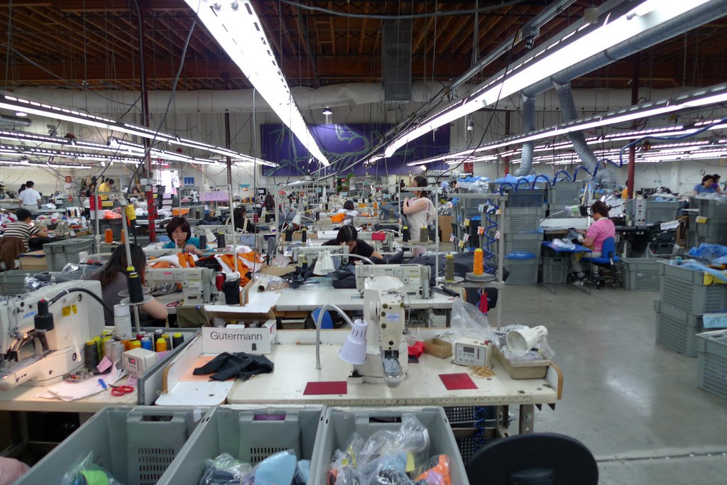 Factory sewing floor for OEM waterproof outerwear quality-control review
