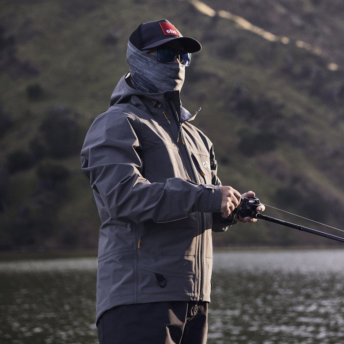 Gray waterproof fishing jacket benchmark for custom shell construction discussion